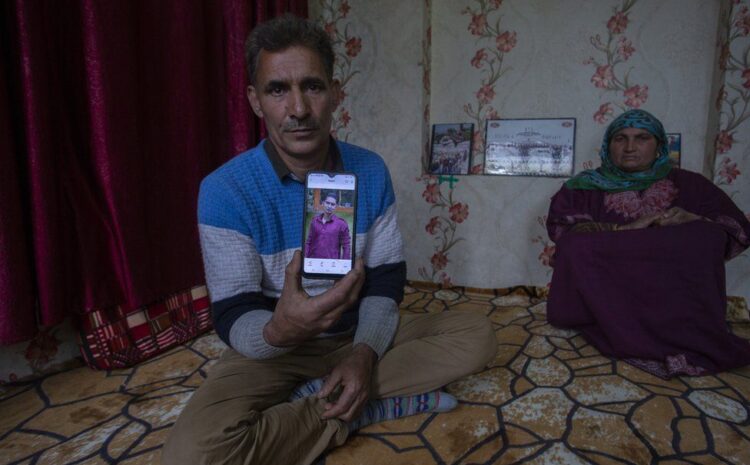 Kashmir: A father digging up the ground to find his missing son