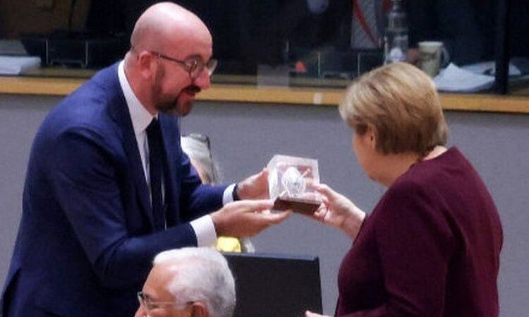 EU leaders give Merkel an ovation at final summit