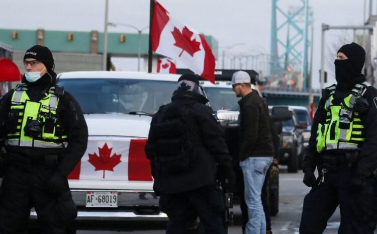  Ambassador Bridge: Police begin clearing Canada trucker blockade