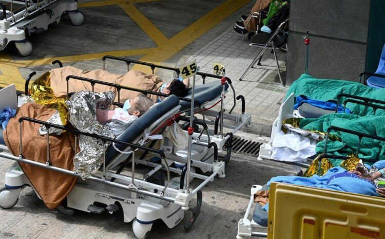 Covid: Hong Kong’s hospitals overwhelmed amid spike in cases